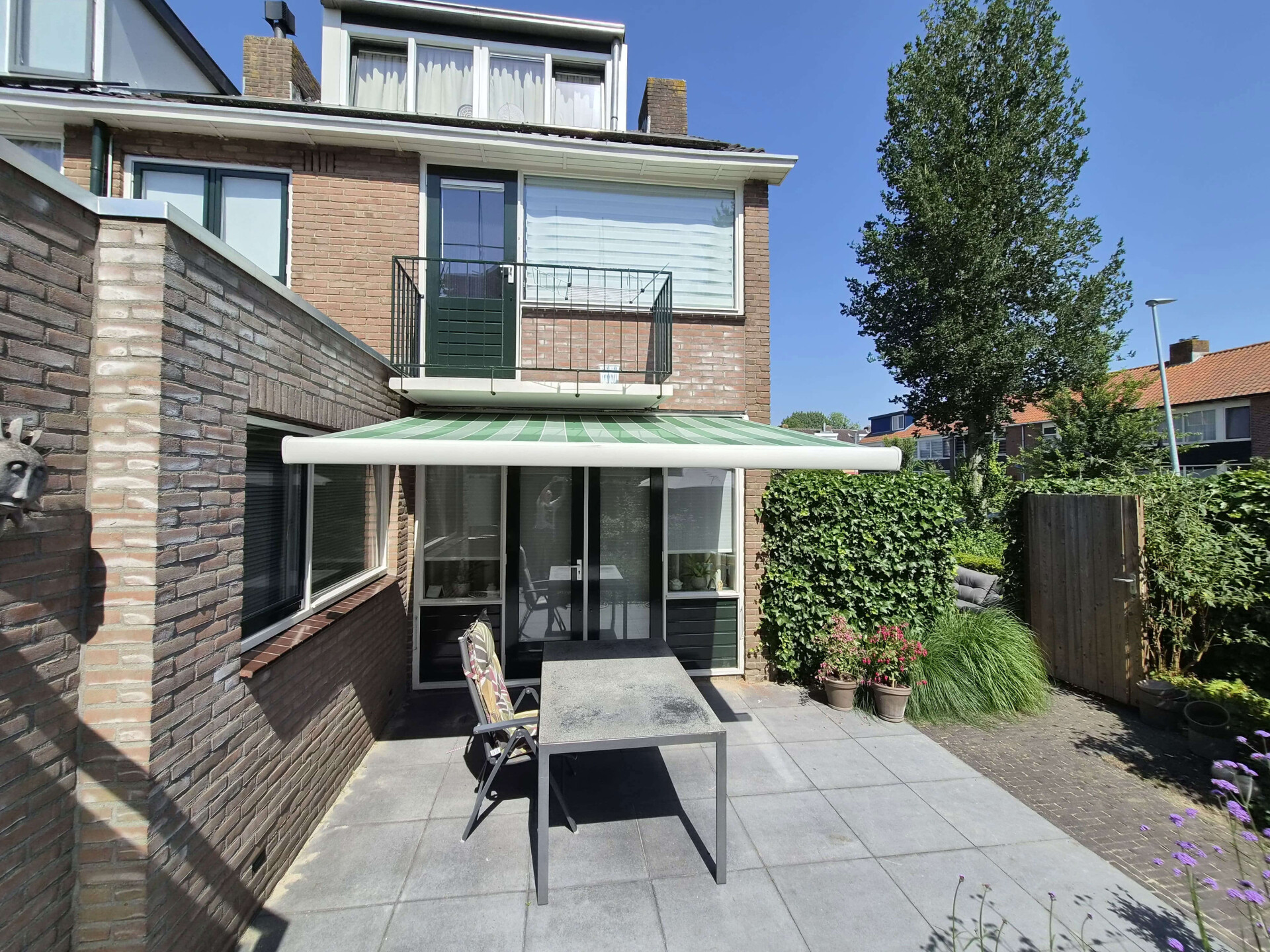 Zonwering onderhoud doek uitvalscherm montage knikarmscherm woerden