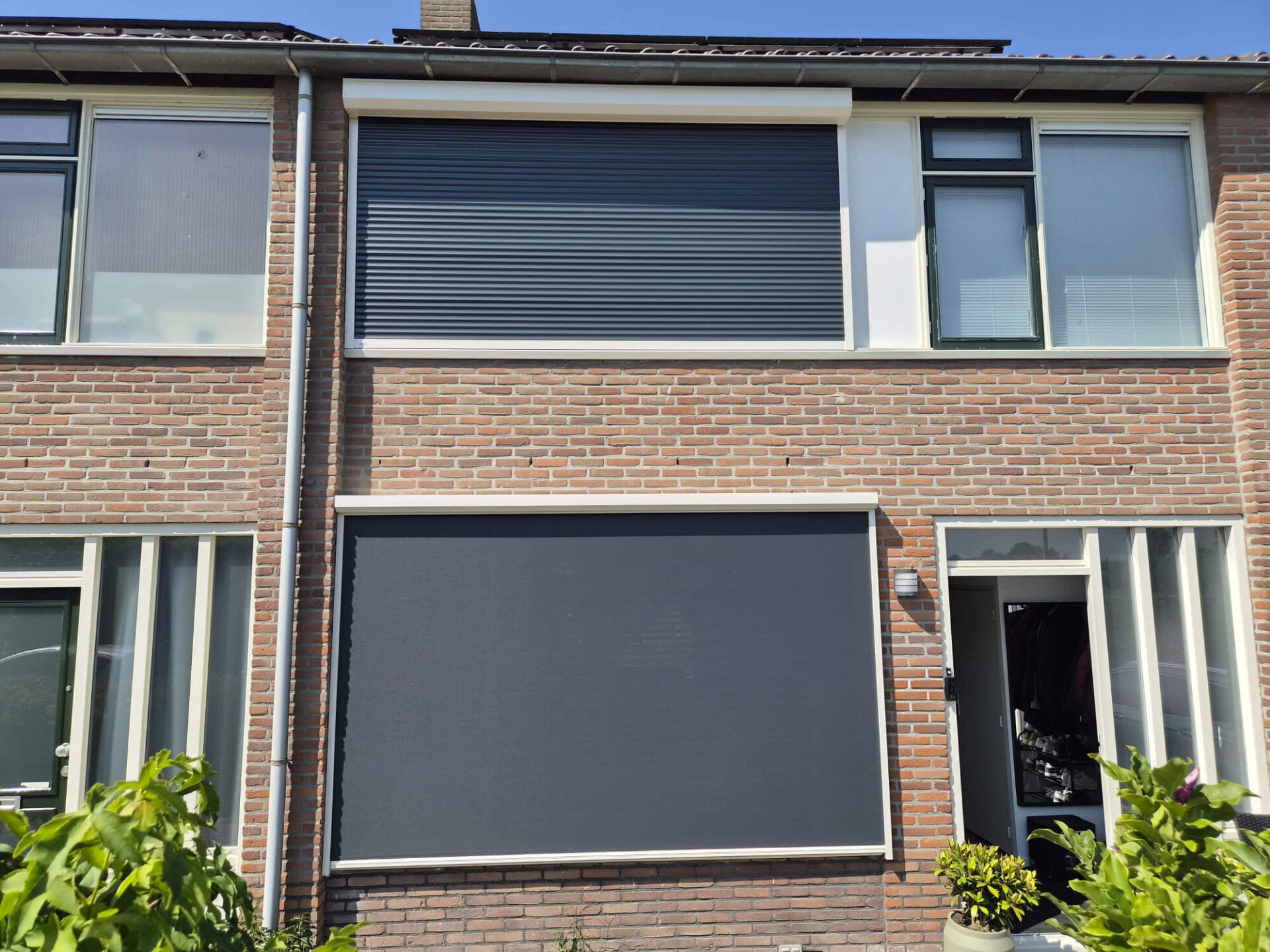 Zonwering rolluik screen windvast woerden somfy woning isolerend verduurzaming roller shutters